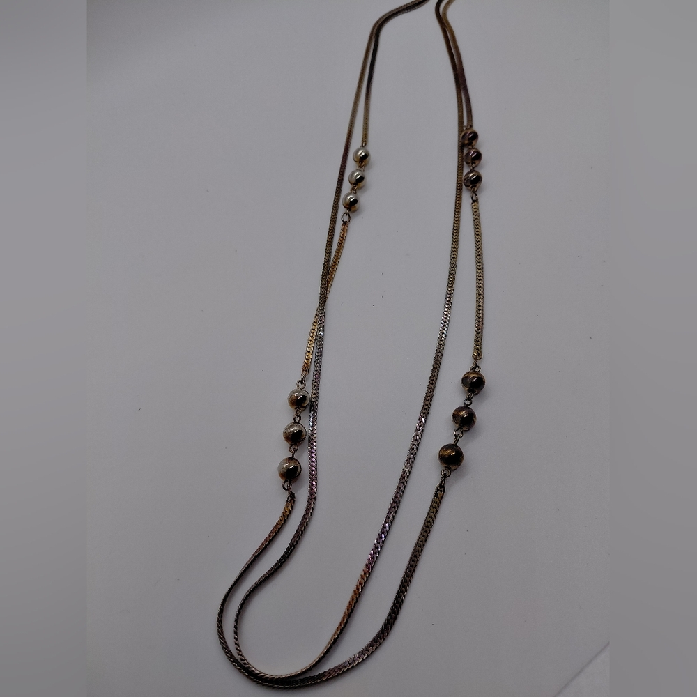 Elegant Gold and Silver Necklace